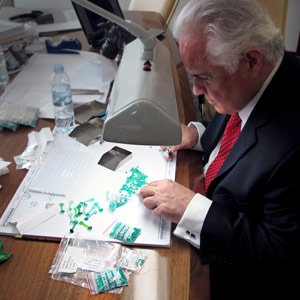 Donald Palmieri Diamond Expert Examining Colored Gemstones